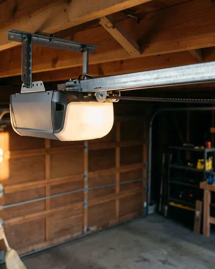A new belt drive opener mounted on the garage ceiling